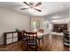 Cozy dining area featuring a round table, wood-look flooring, and seamless flow into adjacent rooms at 4102 E Palm Beach Dr, Chandler, AZ 85249