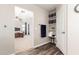 Hallway view into bedroom showcases closet with shelving and a stool for convenience at 4102 E Palm Beach Dr, Chandler, AZ 85249