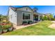 Charming backyard with a garden, lush lawn, and easy access to the outdoor patio at 4442 E Fairbrook St, Mesa, AZ 85205