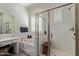 Bright bathroom with shower, vanity, tub, and lots of natural light at 4442 E Fairbrook St, Mesa, AZ 85205