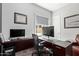 Office featuring a large desk, lots of light, and certificate on wall at 4442 E Fairbrook St, Mesa, AZ 85205