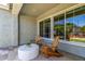 Cozy outdoor patio features comfortable chairs and a table, perfect for relaxation at 4442 E Fairbrook St, Mesa, AZ 85205