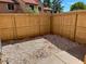 Private backyard features a rock garden, wooden fence, and concrete patio for outdoor enjoyment at 4601 N 102Nd Ave # 1052, Phoenix, AZ 85037