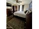 Comfortable bedroom with ample closet space, dresser, and decorative rug at 4767 W Wahalla Ln, Glendale, AZ 85308