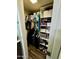 Walk-in closet, fitted with shelves and rods, for maximum storage with wood floors at 4767 W Wahalla Ln, Glendale, AZ 85308