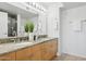 Bright bathroom featuring dual sinks, granite countertops, and excellent lighting at 4808 N 24Th St # 1228, Phoenix, AZ 85016