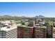Expansive city view with mountains, golf course, and modern buildings in the distance at 4808 N 24Th St # 1228, Phoenix, AZ 85016