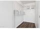 Walk-in closet with white wire shelving and wood-look floors at 4808 N 24Th St # 1228, Phoenix, AZ 85016
