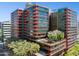 Modern multi-story building showcasing unique architectural design and lush rooftop greenery at 4808 N 24Th St # 1228, Phoenix, AZ 85016