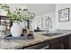Bright kitchen features granite countertops, sleek appliances, and a modern faucet at 4808 N 24Th St # 1228, Phoenix, AZ 85016