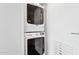 Efficient laundry area with stacked washer and dryer, maximizing space at 4808 N 24Th St # 1228, Phoenix, AZ 85016