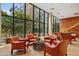 Bright lobby with comfortable lounge seating, large windows, and modern staircase at 4808 N 24Th St # 1228, Phoenix, AZ 85016