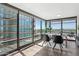 Bright office space with floor-to-ceiling windows, a desk, and modern furnishings at 4808 N 24Th St # 1228, Phoenix, AZ 85016