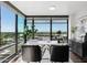 Bright home office with large windows offering panoramic city views at 4808 N 24Th St # 1228, Phoenix, AZ 85016