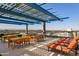 Community rooftop deck offers outdoor seating and great city views at 4808 N 24Th St # 1228, Phoenix, AZ 85016