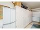 Ample storage abounds in this spacious garage, featuring a wall of built-in cabinets and an epoxy floor at 4928 E Paradise Ln, Scottsdale, AZ 85254