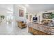 Bright living room with tile floors, traditional furnishings, and an open layout with a combined dining area at 4928 E Paradise Ln, Scottsdale, AZ 85254