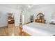 This is a spacious main bedroom with a mirror and vaulted ceiling at 4928 E Paradise Ln, Scottsdale, AZ 85254