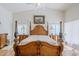 Beautiful main bedroom with a framed painting above the bed at 4928 E Paradise Ln, Scottsdale, AZ 85254