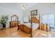 This is a spacious main bedroom with a vaulted ceiling and a ceiling fan at 4928 E Paradise Ln, Scottsdale, AZ 85254