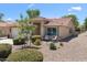 Charming single-story home with well-kept front yard and desert landscaping, offering curb appeal at 5024 S Citrus Ct, Gilbert, AZ 85298