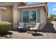 Cozy front porch with seating, perfect for enjoying the neighborhood ambiance and curb appeal at 5024 S Citrus Ct, Gilbert, AZ 85298
