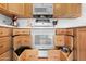 Bright kitchen featuring a white oven, plentiful storage drawers, and modern appliances at 5024 S Citrus Ct, Gilbert, AZ 85298