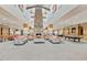The lounge features a stone fireplace, ample seating and billiards for residents at 5024 S Citrus Ct, Gilbert, AZ 85298