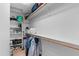 Organized walk-in closet with shelves, racks, and ample storage space at 5024 S Citrus Ct, Gilbert, AZ 85298