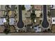 Overhead view of homes in a quiet subdivision with mature trees and cul-de-sac street at 5148 E Edgewood Cir, Mesa, AZ 85206
