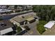 An elevated rear view of the home shows a low-maintenance yard with decorative rock and mature shade trees at 5148 E Edgewood Cir, Mesa, AZ 85206