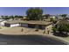 Corner lot home offers xeriscape landscape and an attached garage; very low maintenance at 5148 E Edgewood Cir, Mesa, AZ 85206