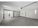 Spacious garage features painted floors and walls, built in cabinets, and plenty of storage at 5148 E Edgewood Cir, Mesa, AZ 85206