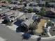 Aerial view of home with solar panels, landscaped yard, and spacious driveway at 5607 W Alyssa Ln, Phoenix, AZ 85083