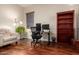 Functional home office with adjustable desk and ergonomic chair at 5607 W Alyssa Ln, Phoenix, AZ 85083