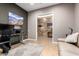 Home office with neutral walls, view to the entryway, and ample workspace at 5607 W Alyssa Ln, Phoenix, AZ 85083