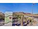 Deem Hills Park sign with park rules and contact information in a desert landscape setting at 5607 W Alyssa Ln, Phoenix, AZ 85083