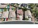 Aerial view of a home with lush backyard swimming pools at 6014 W Oberlin Way, Phoenix, AZ 85083