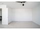 Clean, carpeted bedroom with a closet and adjacent railing view from an open door at 6014 W Oberlin Way, Phoenix, AZ 85083