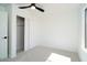 Bedroom with modern ceiling fan and closet with sliding doors at 6014 W Oberlin Way, Phoenix, AZ 85083