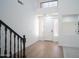 Bright entryway with wood floors, transom window, and glass block sidelights at 6014 W Oberlin Way, Phoenix, AZ 85083
