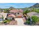 Charming two-story home showcasing a desert landscape, mountains, and a private garage at 6014 W Oberlin Way, Phoenix, AZ 85083