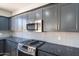 Well-equipped kitchen features modern appliances, ample counter space, and stylish cabinetry at 6014 W Oberlin Way, Phoenix, AZ 85083