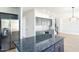 Spacious kitchen with a large center island, stainless steel appliances, and contemporary finishes at 6014 W Oberlin Way, Phoenix, AZ 85083