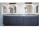 Bathroom features dual vanities, modern lighting, grey countertop, and dark wood cabinets at 6014 W Oberlin Way, Phoenix, AZ 85083