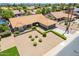 A house features a meticulously landscaped front yard, complemented by a well-maintained driveway and surroundings at 6017 E Kathleen Rd, Scottsdale, AZ 85254