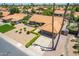 Aerial view of the house with palm trees and a well-kept front yard at 6017 E Kathleen Rd, Scottsdale, AZ 85254