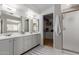 Spacious bathroom with double vanity, walk-in shower, and linen closet at 6017 E Kathleen Rd, Scottsdale, AZ 85254