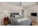 Comfortable bedroom features a cozy bed, bedside table, and well-lit atmosphere at 6017 E Kathleen Rd, Scottsdale, AZ 85254