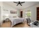 Bedroom featuring a desk area, natural light, and comfortable bed at 6017 E Kathleen Rd, Scottsdale, AZ 85254